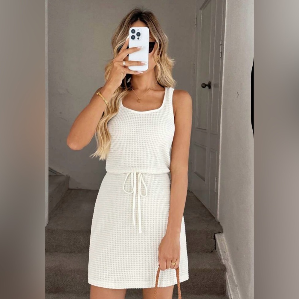 Elegant Cream Sleeveless Dress